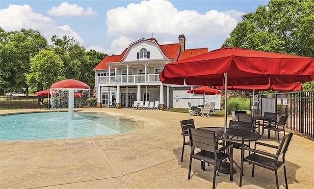 view of pool featuring a patio area