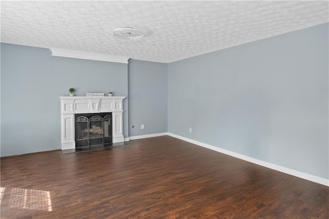 152 Maxton Ave, Dallas, GA 30132 - unfurnished living room featuring dark wood finished floors, baseboards, a fireplace, and a textured ceiling
