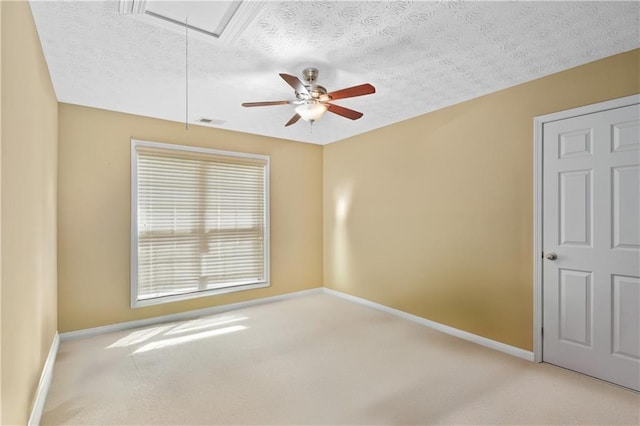 152 Maxton Ave, Dallas, GA 30132 - carpeted spare room featuring attic access, baseboards, ceiling fan, and a textured ceiling