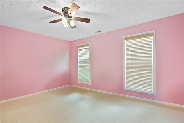 152 Maxton Ave, Dallas, GA 30132 - empty room with carpet, baseboards, a ceiling fan, and a textured ceiling