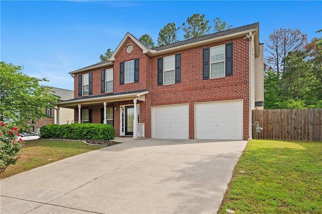 152 Maxton Ave, Dallas, GA 30132 - traditional home with an attached garage, driveway, brick siding, and covered porch