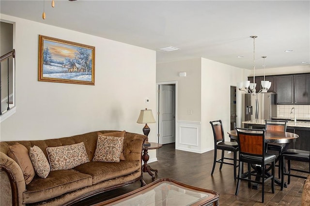 3013 Nicholas Dr, Villa Rica, GA 30180 - living room with dark wood-style flooring and recessed lighting