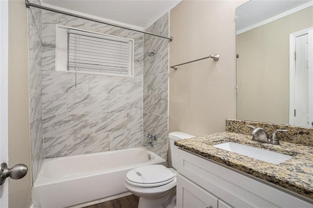 full bath with vanity, ornamental molding, washtub / shower combination, and toilet