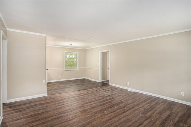 unfurnished room with an inviting chandelier, baseboards, ornamental molding, and dark wood-style flooring