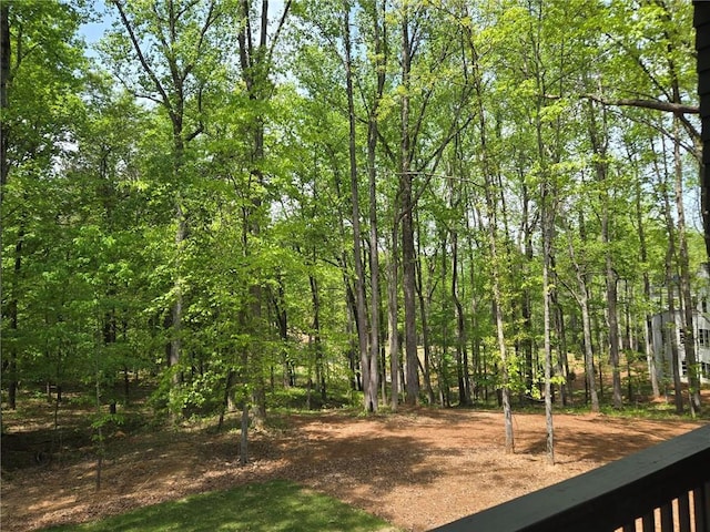 view of yard featuring a view of trees