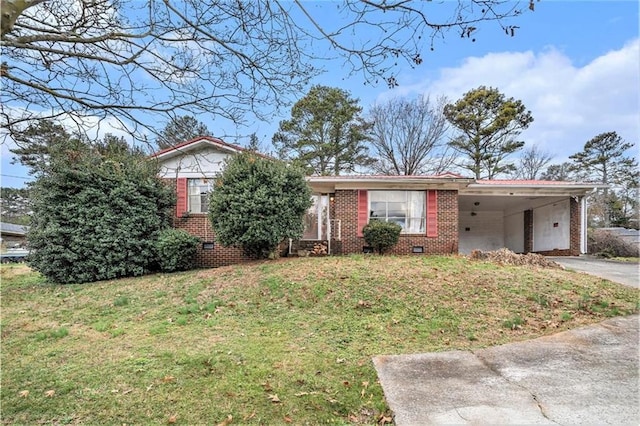 ranch-style house with a front yard and a carport