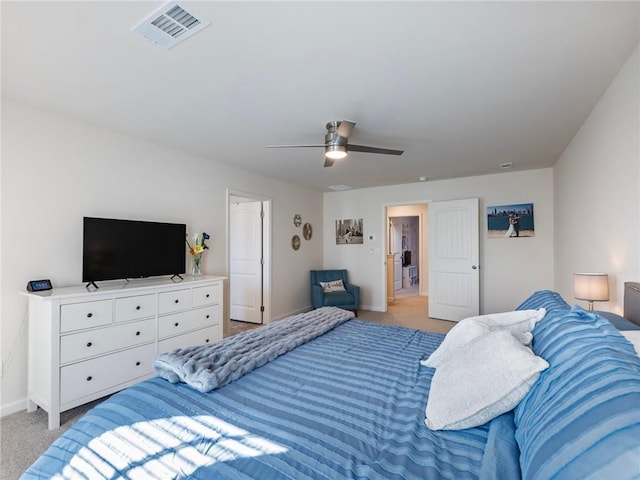 bedroom featuring ceiling fan and light carpet