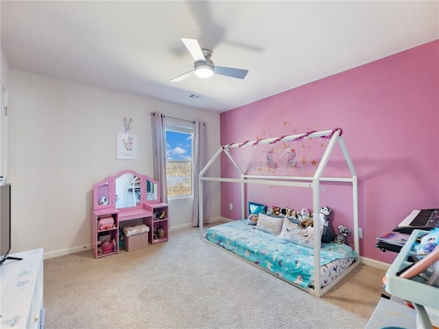 carpeted bedroom featuring ceiling fan