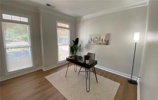 office with crown molding, baseboards, and dark wood-type flooring