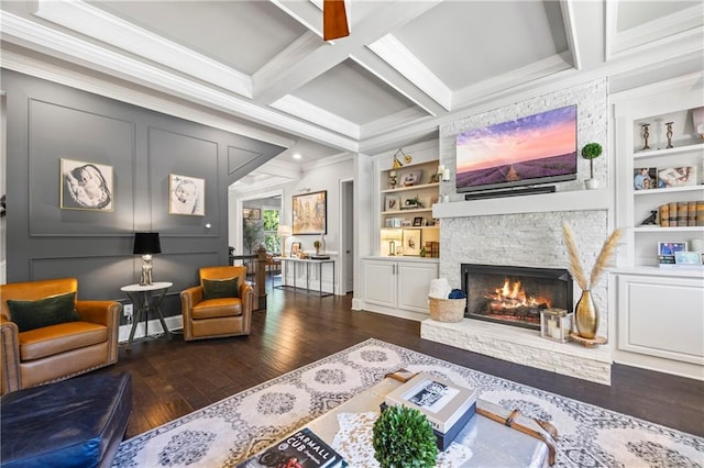 3111 Old Thompson Mill Rd, Buford, GA 30519 - living area with hardwood / wood-style flooring, ornamental molding, a fireplace, built in shelves, and beamed ceiling