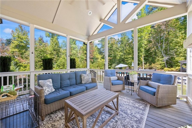 3111 Old Thompson Mill Rd, Buford, GA 30519 - sunroom featuring an outdoor hangout area, lofted ceiling, and view of scattered trees