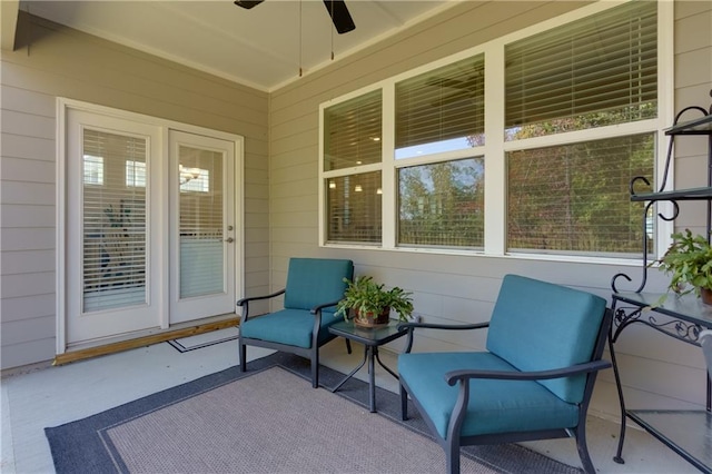 view of patio featuring ceiling fan