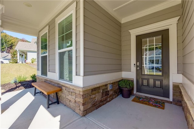 entrance to property with a porch