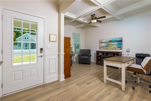 office area with light wood-type flooring, beam ceiling, ceiling fan, and coffered ceiling