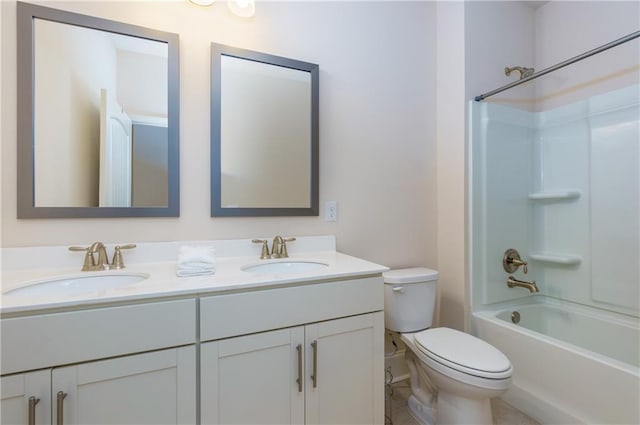 full bathroom featuring toilet, vanity, and bathing tub / shower combination