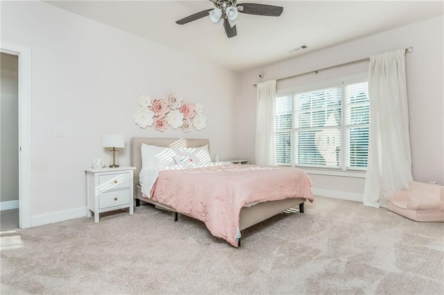 bedroom with light carpet and ceiling fan