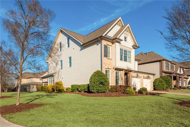 view of side of property with a yard