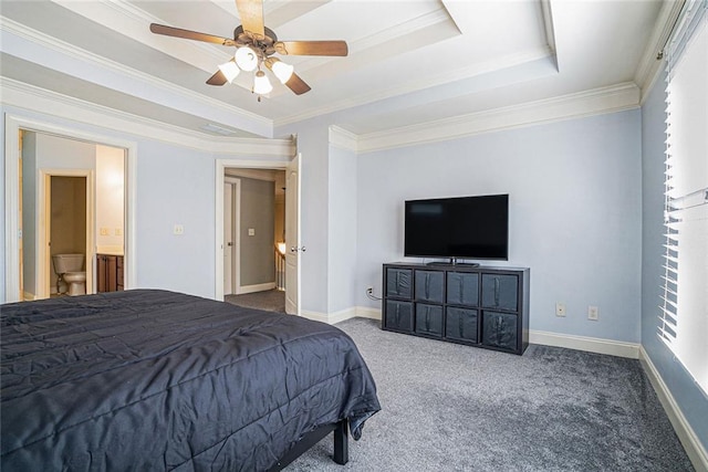 3641 Mountain Cove Rd, Snellville, GA 30039 - carpeted bedroom with a tray ceiling, baseboards, crown molding, ceiling fan, and ensuite bath