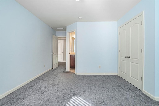 3641 Mountain Cove Rd, Snellville, GA 30039 - unfurnished bedroom with carpet and baseboards