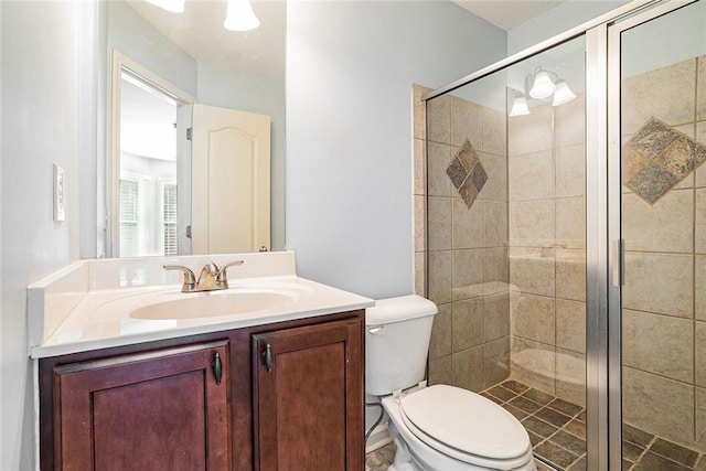 3641 Mountain Cove Rd, Snellville, GA 30039 - full bath featuring a shower stall, vanity, and toilet