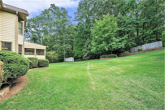 3641 Mountain Cove Rd, Snellville, GA 30039 - view of yard featuring a storage unit and an outdoor structure