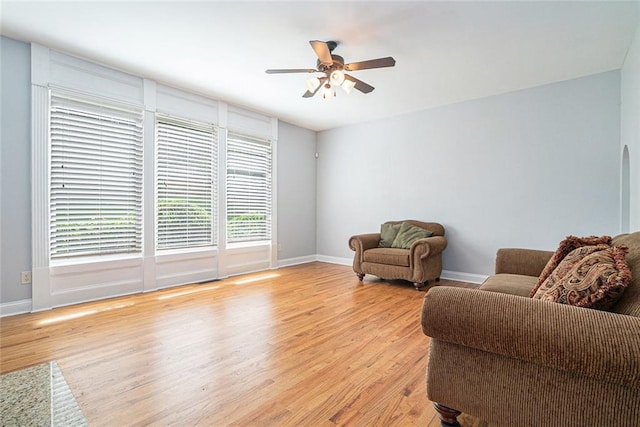 3641 Mountain Cove Rd, Snellville, GA 30039 - living room with light wood finished floors, ceiling fan, and baseboards