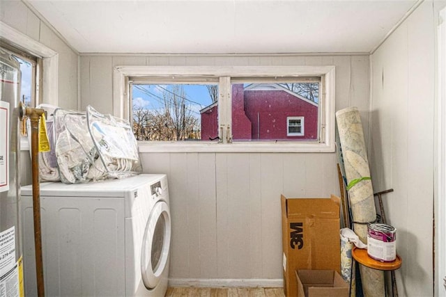 washroom featuring laundry area and independent washer and dryer