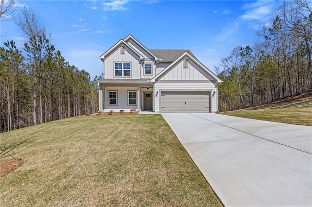 view of front facade with a porch, board and batten siding, a front yard, concrete driveway, and an attached garage