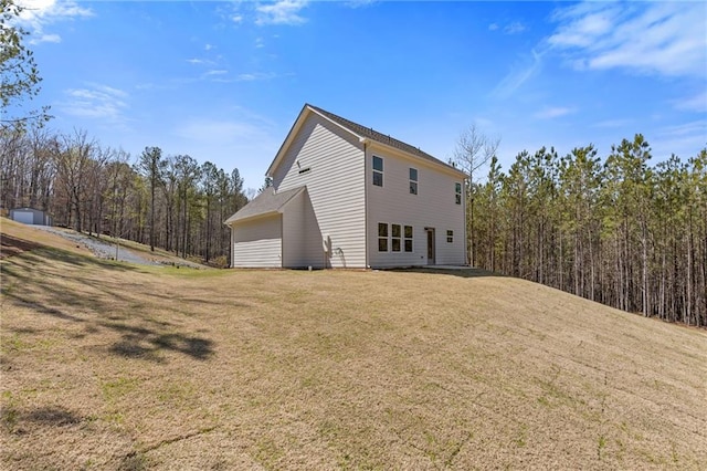 view of home's exterior featuring a lawn