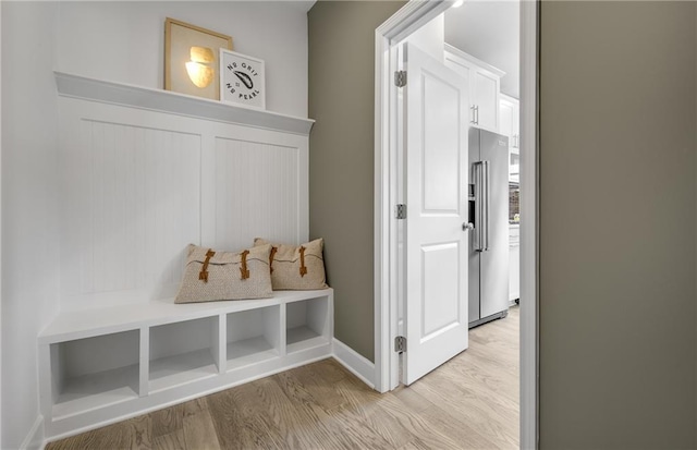 mudroom with light wood-type flooring