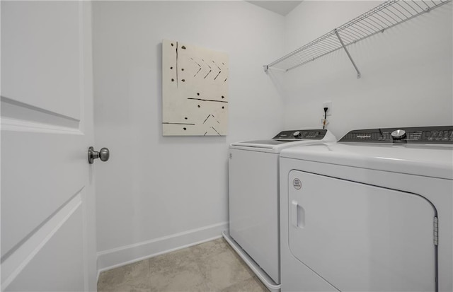 laundry area with washer and clothes dryer