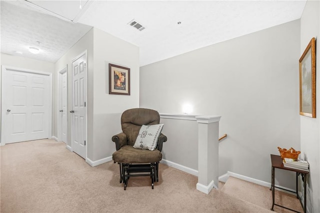 1622 Honeysuckle Path, Conyers, GA 30012 - sitting room with carpet floors, an upstairs landing, baseboards, and attic access