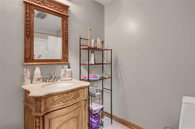 652 Post Oak Rd, Jonesboro, GA 30238 - bathroom featuring vanity and toilet