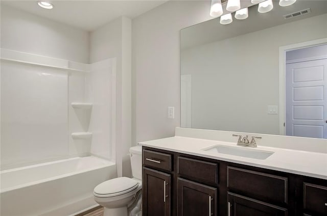 full bathroom with vanity, tub / shower combination, and toilet