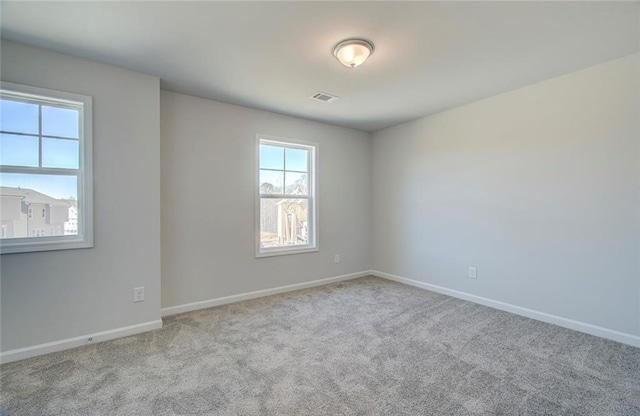 view of carpeted spare room