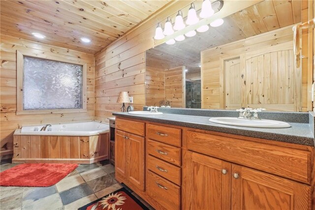 bathroom with double sink vanity, wooden walls, and wood ceiling