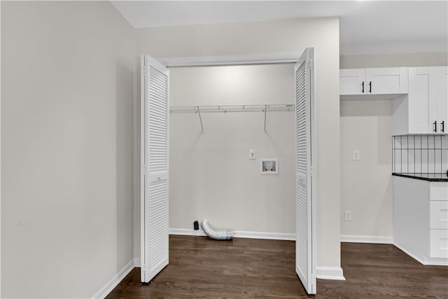 laundry area with dark hardwood / wood-style flooring and hookup for a washing machine