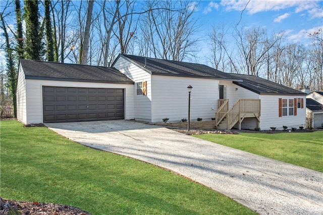 exterior space with a front lawn and a garage