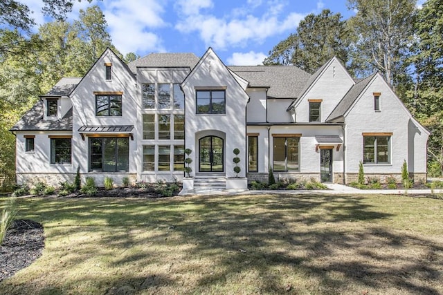 view of front facade with a front lawn