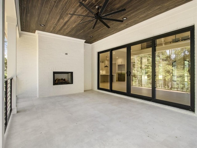 view of patio / terrace featuring ceiling fan