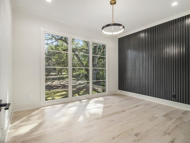 spare room with light wood-type flooring