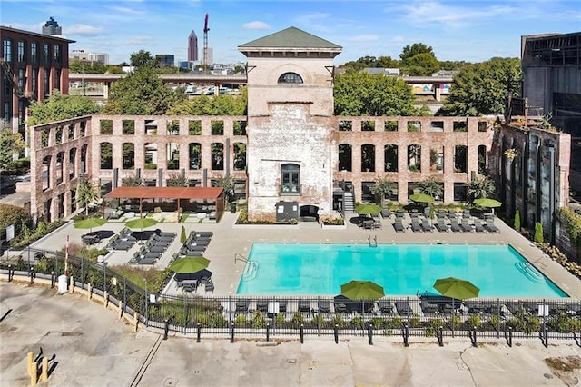 view of swimming pool featuring a patio area