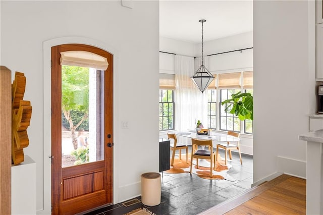 entrance foyer with hardwood / wood-style floors