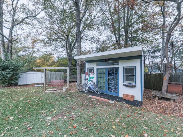 view of outdoor structure with a yard