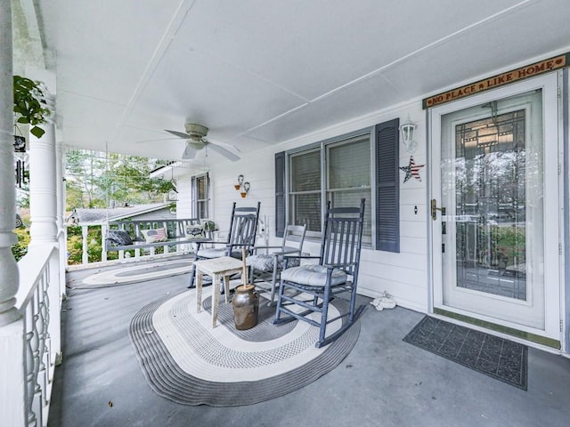 view of patio / terrace with ceiling fan and a porch