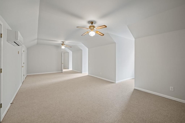 additional living space featuring an AC wall unit, lofted ceiling, light carpet, and ceiling fan