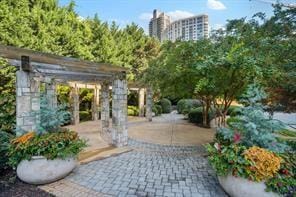 view of home's community featuring a patio