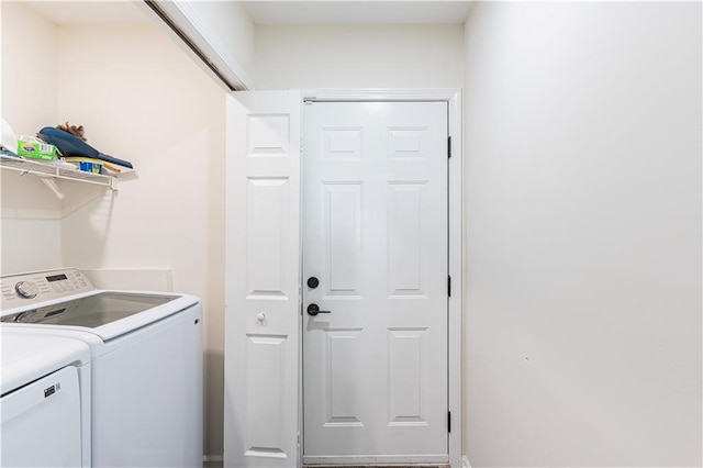 washroom with laundry area and washing machine and clothes dryer