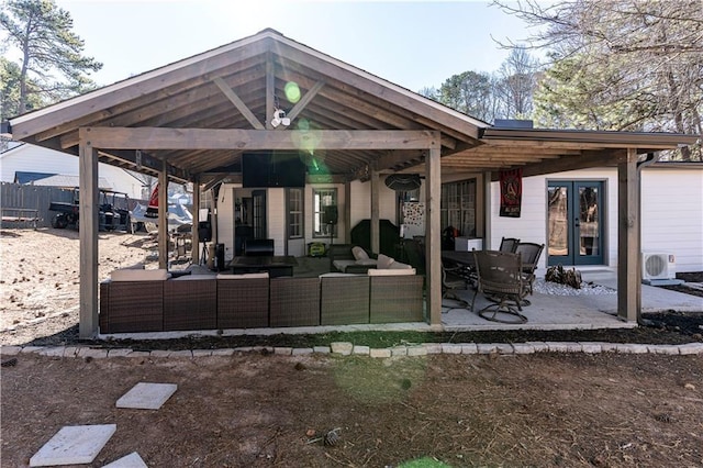 view of patio / terrace featuring ac unit and an outdoor hangout area