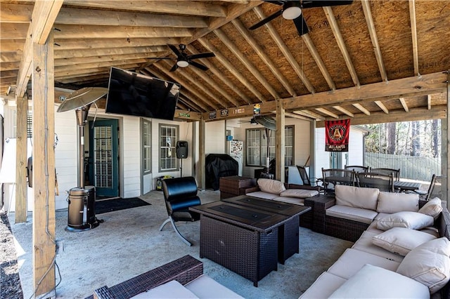 view of patio with outdoor dining area, area for grilling, outdoor lounge area, fence, and a ceiling fan